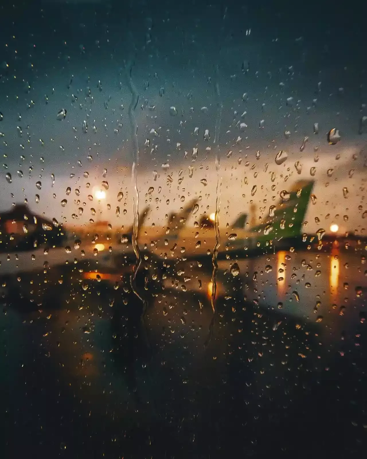 Rain out the window of airplane at CAN