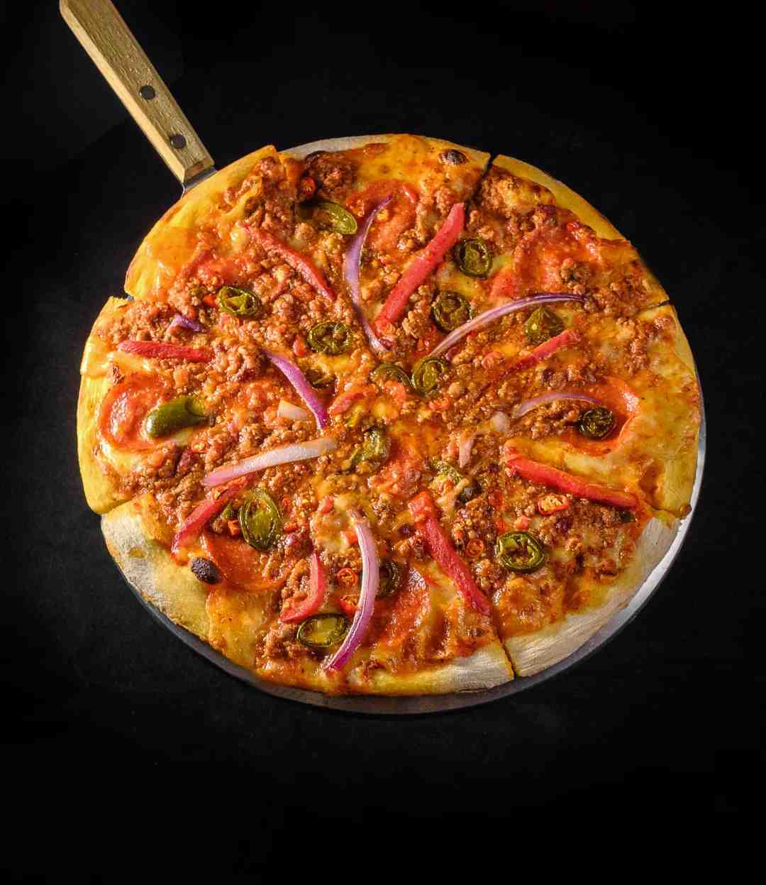 Freshly baked pizza served at Hooley's Irish Pub Guangzhou.