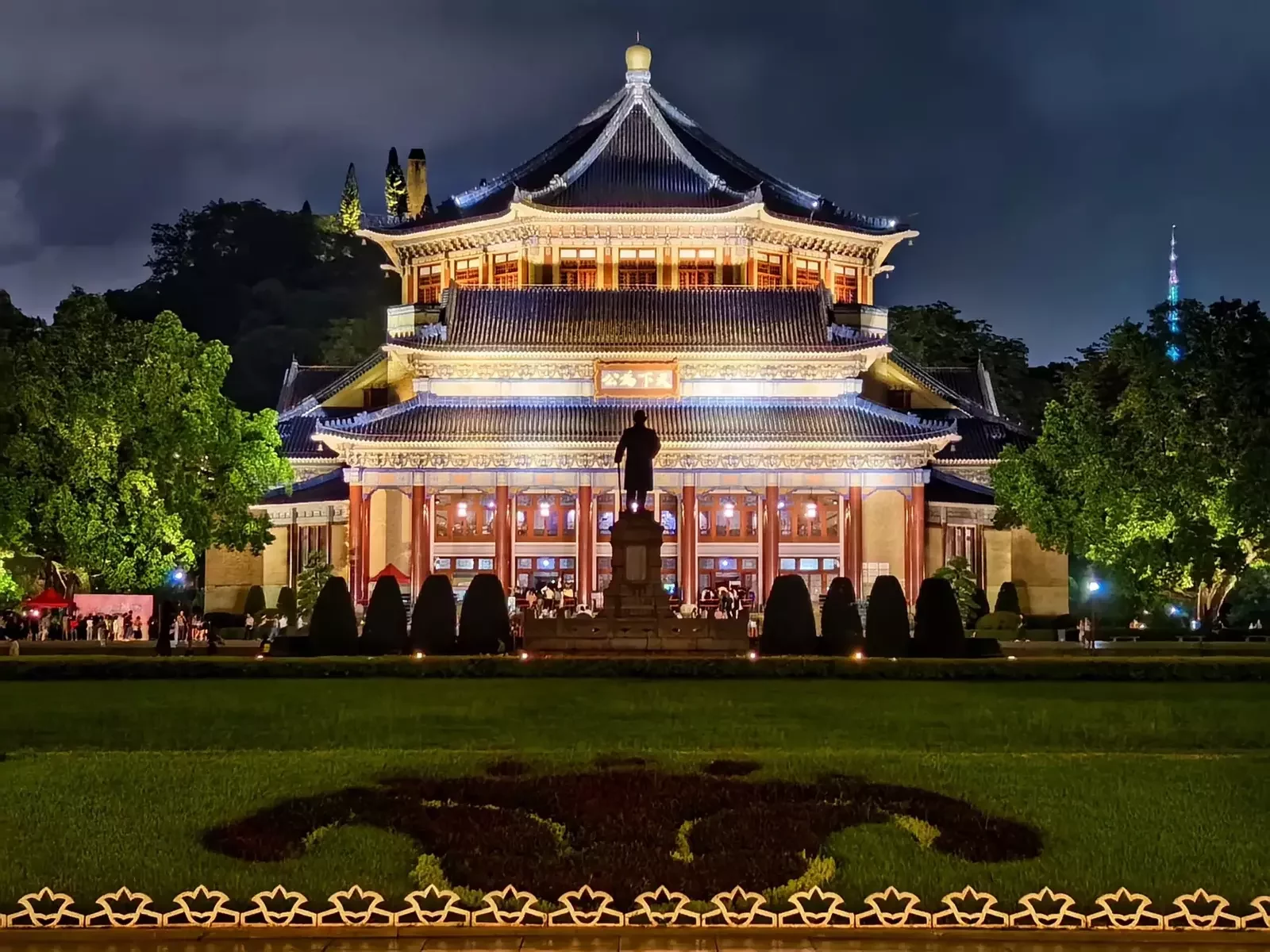 Sun Yat-sen Memorial Hall Guangzhou illuminated at night with the park open to visitors